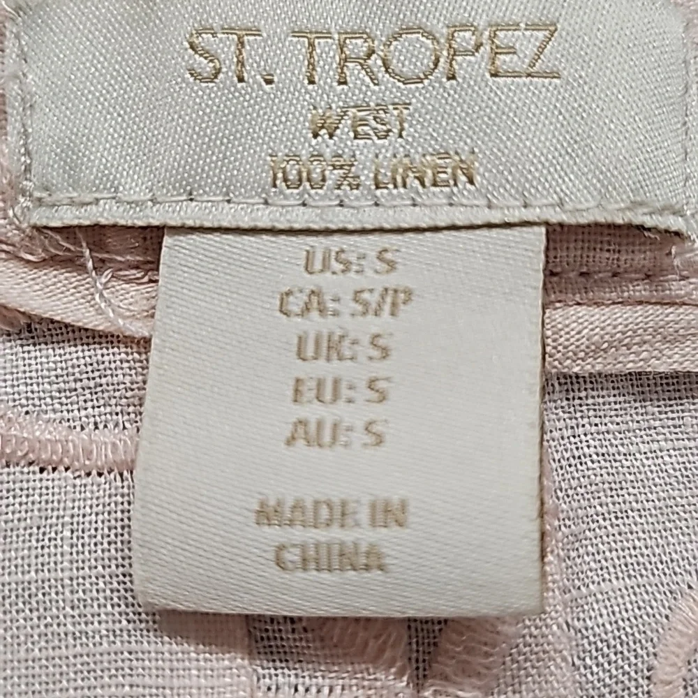 St. Tropez women's light pink top. Embrodery.V neck with three buttons.‎